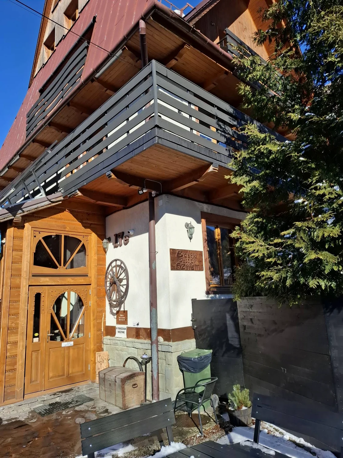 Wooden exterior entrance of Marzanna i Ryszard Bubka